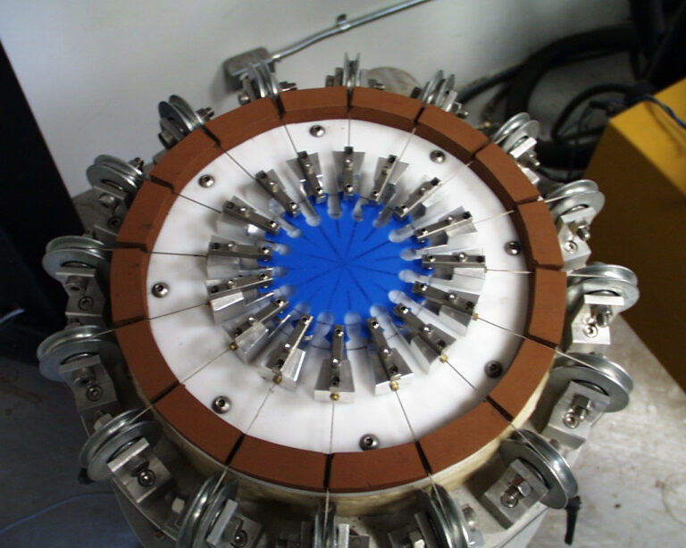 Elastomer equal biaxial test instrument for hyperelastic material models.